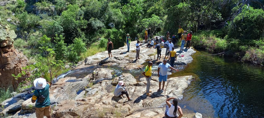 crowd on a rocky outcrop